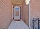 Close-up of front door with sidelights offering an inviting entrance at 170 Habersham Dr, Fayetteville, GA 30214