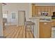 Kitchen area featuring a breakfast bar with modern stools and ample counter space at 170 Habersham Dr, Fayetteville, GA 30214