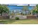 Charming Fayetteville mural depicting city life with people and bikes surrounded by brick and an arch at 170 Habersham Dr, Fayetteville, GA 30214