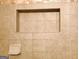 Close up on tiled shower stall with soap dish and inset shelf at 170 Habersham Dr, Fayetteville, GA 30214