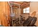 Basement workout room with weightlifting equipment and unfinished walls at 11 Line Creek Cir, Sharpsburg, GA 30277