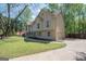 Charming two-story home showcasing landscaped front yard and a driveway at 11 Line Creek Cir, Sharpsburg, GA 30277