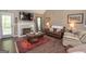Cozy living room with fireplace, comfortable seating, and stylish decor at 11 Line Creek Cir, Sharpsburg, GA 30277
