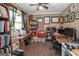 Bright office space with built-in shelving, large windows, and wooden floors at 11 Line Creek Cir, Sharpsburg, GA 30277