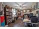 Comfortable office space with built-in shelving, desk, and natural light at 11 Line Creek Cir, Sharpsburg, GA 30277
