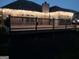 Inviting back deck with outdoor lighting, perfect for evening relaxation and entertaining in the backyard at 1128 Carillon Se Dr, Conyers, GA 30013