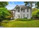 Stately home with a well-manicured lawn and classic architectural details, including columns and a grand entrance at 2810 Jodeco Ter, Jonesboro, GA 30236