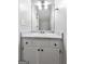 White vanity in bathroom with new countertops, and a mirror at 11203 Hemlock Rd, Hampton, GA 30228
