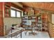 Attic area featuring a unique bookcase and seating area at 120 Tall Pine Dr, Fayetteville, GA 30214