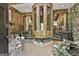 Unique foyer featuring wood paneled walls, tile floors, and a koi pond at 120 Tall Pine Dr, Fayetteville, GA 30214