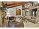 Bright living room features stone fireplace, wood accents, and stylish seating arrangement at 120 Tall Pine Dr, Fayetteville, GA 30214