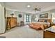 Spacious main bedroom suite showcasing a ceiling fan and lots of natural light at 120 Tall Pine Dr, Fayetteville, GA 30214