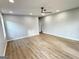 Large room with hardwood floors, ceiling fan and recessed lighting at 3189 Jackson, Hapeville, GA 30354