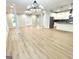 Open floor plan featuring wood floors, recessed lights, and a seamless transition to the gourmet kitchen at 3189 Jackson, Hapeville, GA 30354