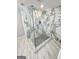 Modern shower featuring marble-style tile and a pebble-stone floor at 3189 Jackson, Hapeville, GA 30354