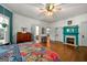 Bright bedroom featuring hardwood floors, vibrant wall design and connecting rooms at 7550 Fielder Rd, Jonesboro, GA 30236