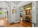 Hallway with view of the bedroom and living room, featuring unique decorative accents at 7550 Fielder Rd, Jonesboro, GA 30236