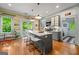 Spacious kitchen featuring an island with seating and a view of the deck at 7550 Fielder Rd, Jonesboro, GA 30236