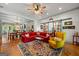 Spacious living room with hardwood floors, high ceilings, and a rustic-chic aesthetic at 7550 Fielder Rd, Jonesboro, GA 30236