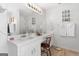 Bright bathroom with dual vanity, large mirror, and modern fixtures at 1152 Strath Clyde Way, Mcdonough, GA 30253