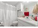 Bright bathroom equipped with a shower, a vanity with a sink, and functional storage for your everyday needs at 1152 Strath Clyde Way, Mcdonough, GA 30253