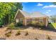Attractive brick home with a well-maintained lawn and landscape at 1152 Strath Clyde Way, Mcdonough, GA 30253