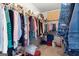 Spacious walk-in closet with ample hanging space and storage solutions at 1152 Strath Clyde Way, Mcdonough, GA 30253