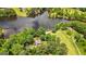 Stunning aerial perspective of a lakeside home with surrounding trees and waterfront views at 312 Flat Shoals Church Rd, Stockbridge, GA 30281
