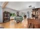 Bright dining room features hardwood floors and scenic views at 312 Flat Shoals Church Rd, Stockbridge, GA 30281