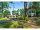 Long driveway leading to the home and garage with an camper parked on the side at 312 Flat Shoals Church Rd, Stockbridge, GA 30281