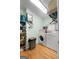 Functional laundry room with washer, dryer, and storage shelves at 312 Flat Shoals Church Rd, Stockbridge, GA 30281