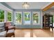 Light filled living room with hardwood floors and views of the lake at 312 Flat Shoals Church Rd, Stockbridge, GA 30281
