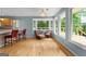 Bright living room with hardwood floors, a bay window, and deck access at 312 Flat Shoals Church Rd, Stockbridge, GA 30281