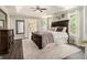 Spacious main bedroom with trey ceiling, ensuite bathroom access, and luxurious finishes at 5409 Trumpet Vine Se Trl, Mableton, GA 30126