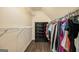 Spacious walk-in closet with ample shelving and hanging space for organized storage at 5409 Trumpet Vine Se Trl, Mableton, GA 30126