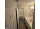 Cozy bathroom with tile flooring, tub, and vanity at 590 Dot Dr, Atlanta, GA 30349