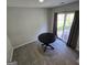 Bright dining area with sliding glass doors to the backyard at 590 Dot Dr, Atlanta, GA 30349