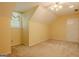 Attic room with yellow walls, beige carpet, a dormer window, and ceiling fan at 145 County Line Ct, Fayetteville, GA 30215