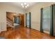 Bright dining room with hardwood floors, wainscoting, and natural light at 145 County Line Ct, Fayetteville, GA 30215