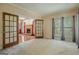 Spacious living room with a cozy fireplace and abundant natural light at 145 County Line Ct, Fayetteville, GA 30215