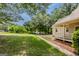 Expansive lawn and a covered porch at 145 County Line Ct, Fayetteville, GA 30215