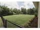 Expansive backyard with lush green grass, ideal for recreation and outdoor enjoyment at 8394 Banks Mill Rd, Douglasville, GA 30135