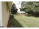 Picturesque backyard with a large detached garage and plenty of green space at 8394 Banks Mill Rd, Douglasville, GA 30135