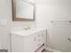 Bathroom featuring a granite vanity and modern fixtures at 8394 Banks Mill Rd, Douglasville, GA 30135