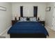 Comfortable bedroom with a large bed, bedside tables, and soft lighting at 228 Hunt Club Cir, Temple, GA 30179