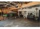 Spacious two-car garage with storage for kayaks, tools, and yard equipment at 228 Hunt Club Cir, Temple, GA 30179