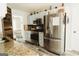 Another view of kitchen featuring stainless steel appliances and light blue cabinets at 228 Hunt Club Cir, Temple, GA 30179