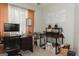 Bright office with ample shelving, multiple tables, and a window view at 228 Hunt Club Cir, Temple, GA 30179