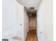 Hallway with hardwood flooring and doors, offering a glimpse into the interior layout of the home at 300 Fox Trail Dr, South Fulton, GA 30349