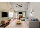 Bright living room featuring a cozy fireplace, hardwood floors, and lots of natural light at 300 Fox Trail Dr, South Fulton, GA 30349